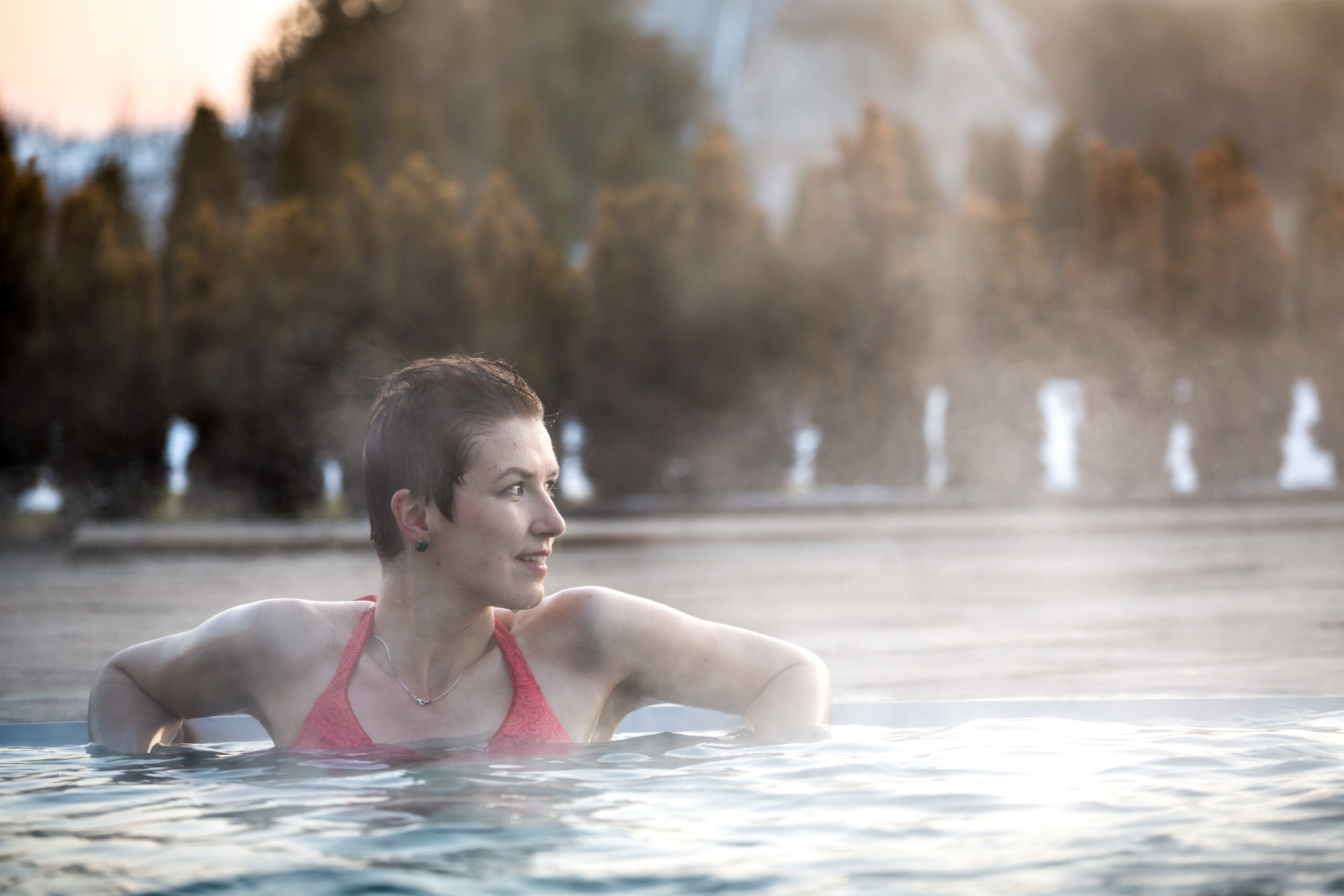 Young,Woman,Relaxing,In,Thermal,Pool.